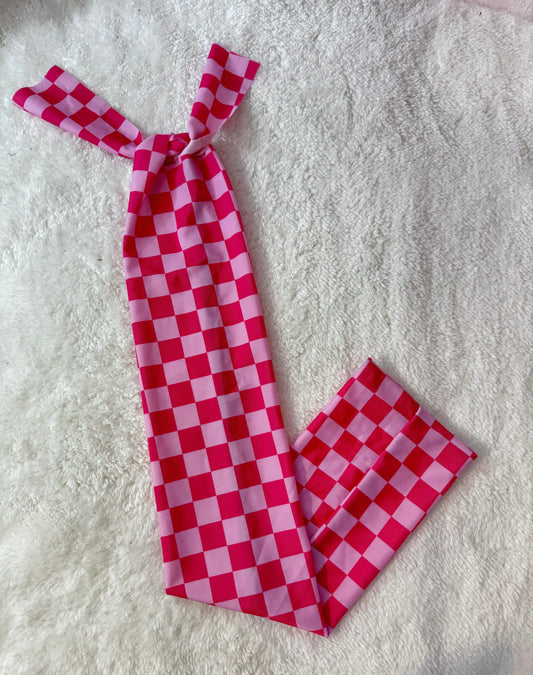 Pink checker tail bag
