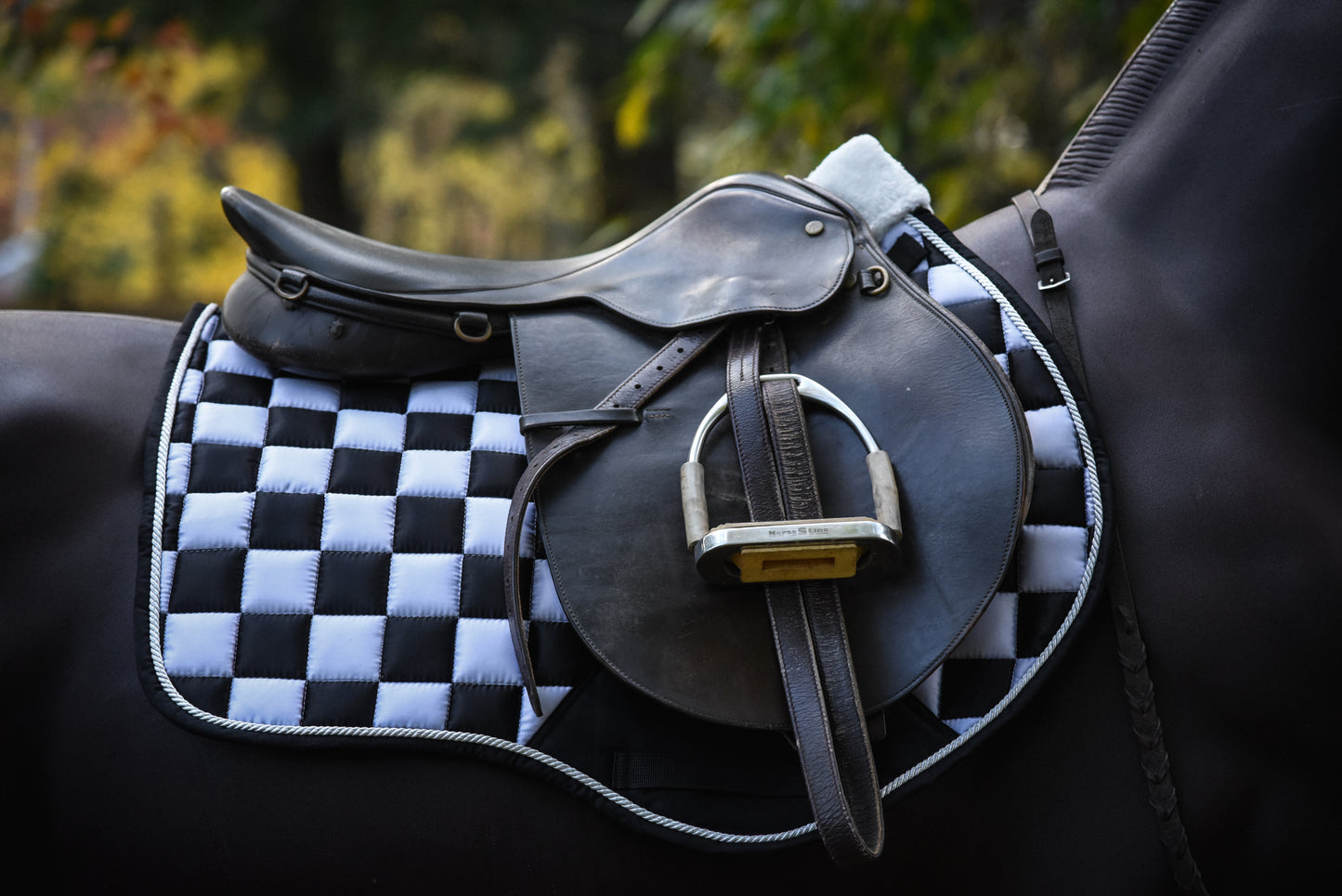 Black/white checker saddle pad