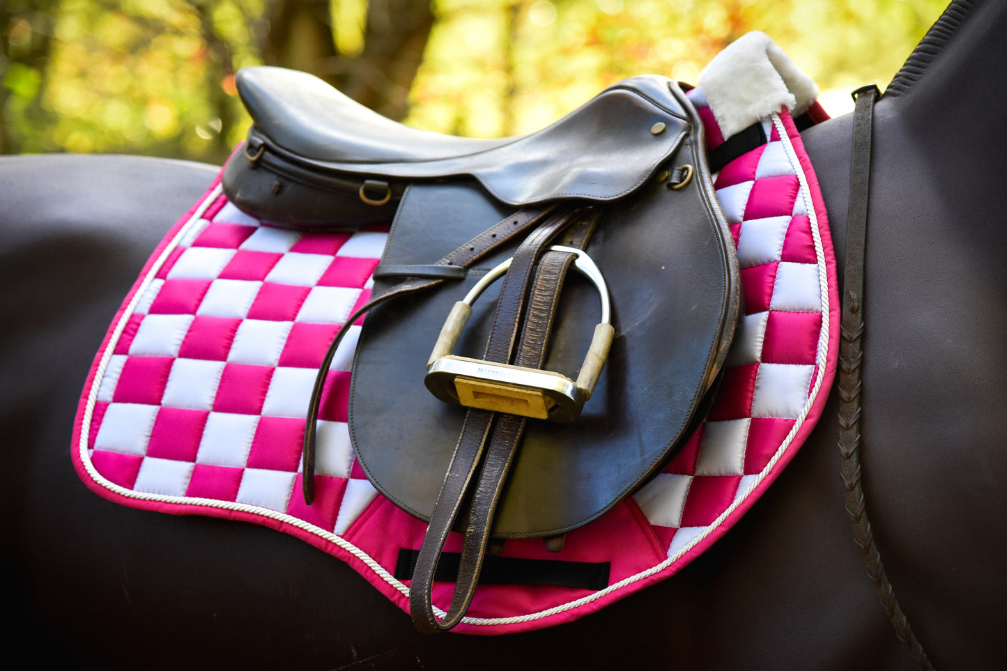 Pink/white checker saddle pad