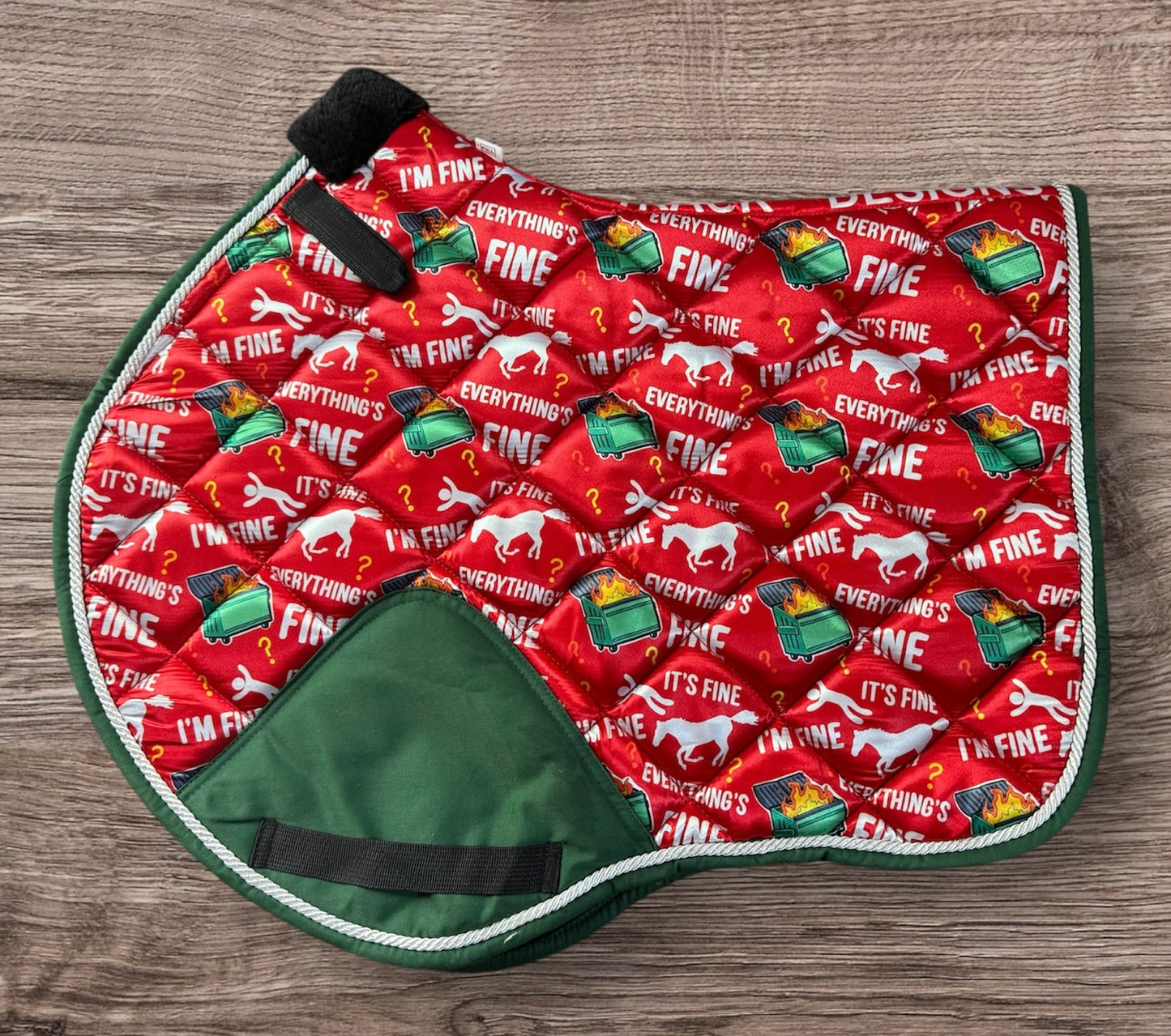 Dumpster fire saddle pad