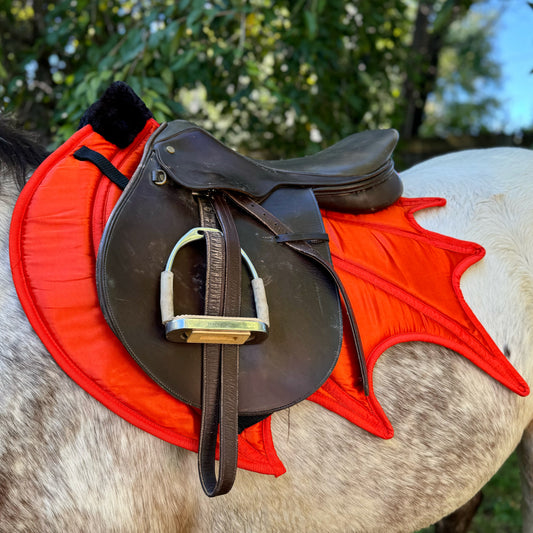 Orange dragon wing saddle pad