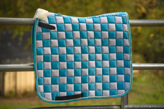Turquoise/white checker dressage pad