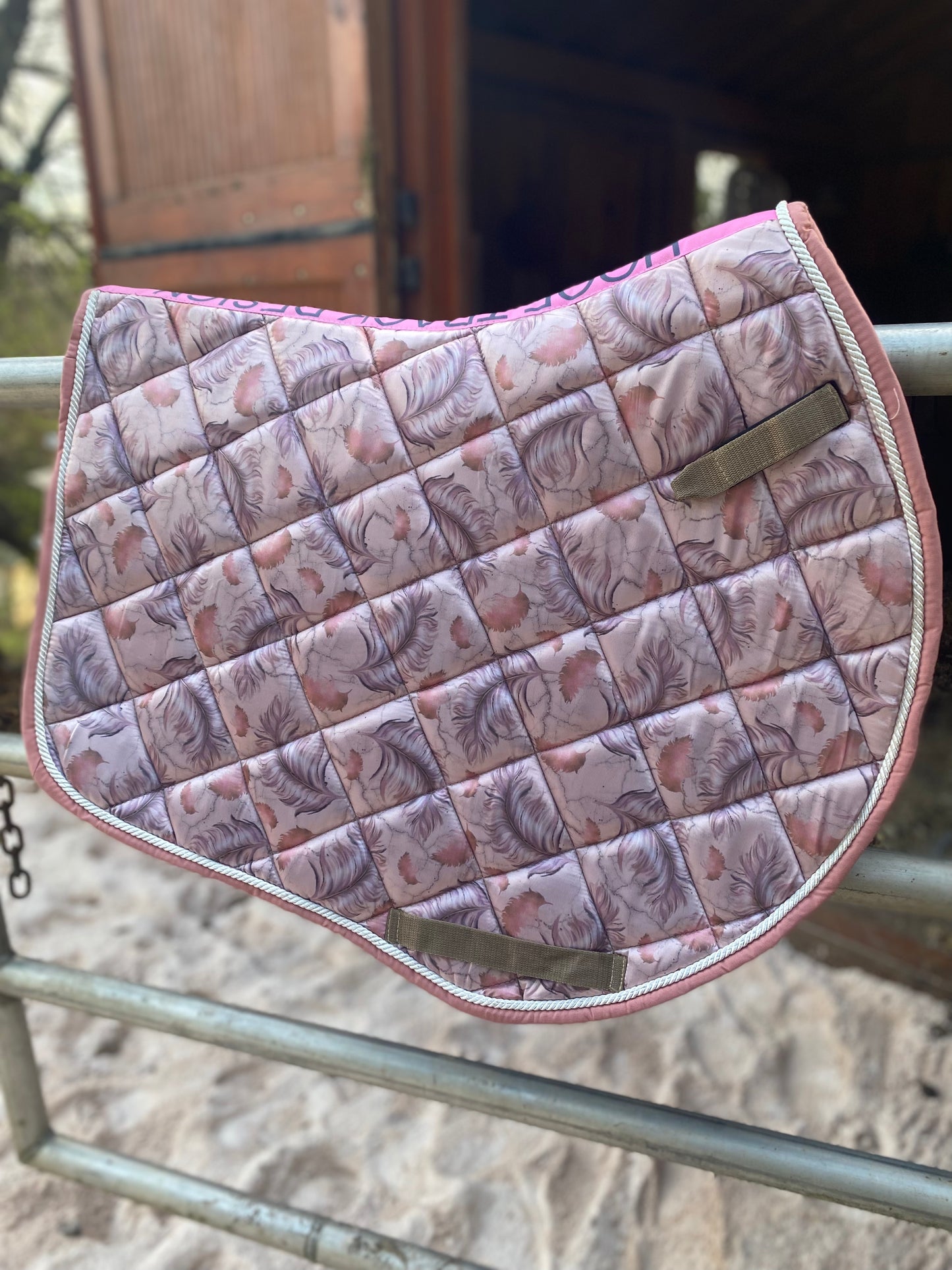 Pink feather jump cut saddle pad